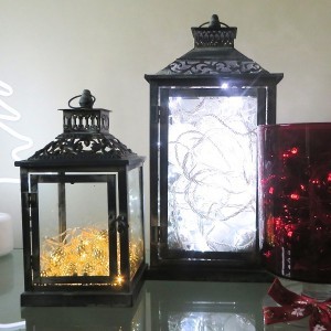 Christmas light filled Hurricane lamp